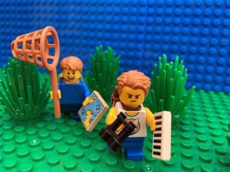 Two children going on an Easter Egg Hunt with clues.