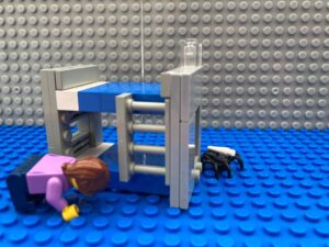 spider crawling off with a child's lost wobbly tooth