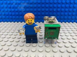 child saving pocket money in a safe