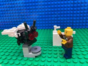 dad chasing a fly in the bathroom