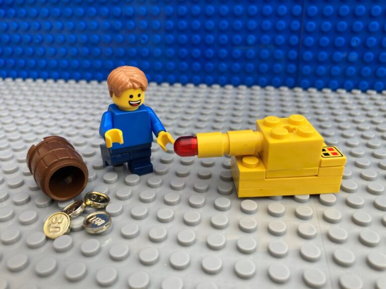 child counting out money to buy a toy tank