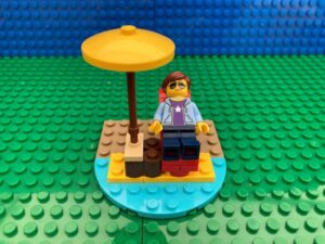 Mum chilling out on a beach - alone