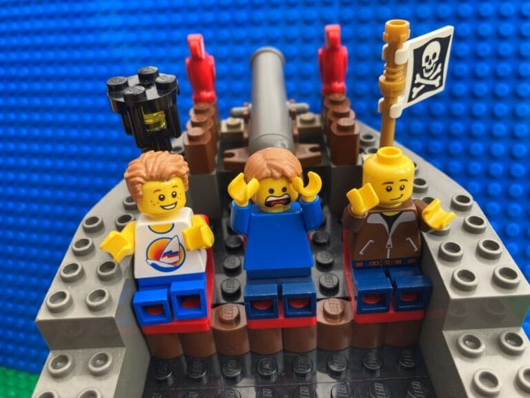 three boys on the swinging pirate ship ride at legoland windsor