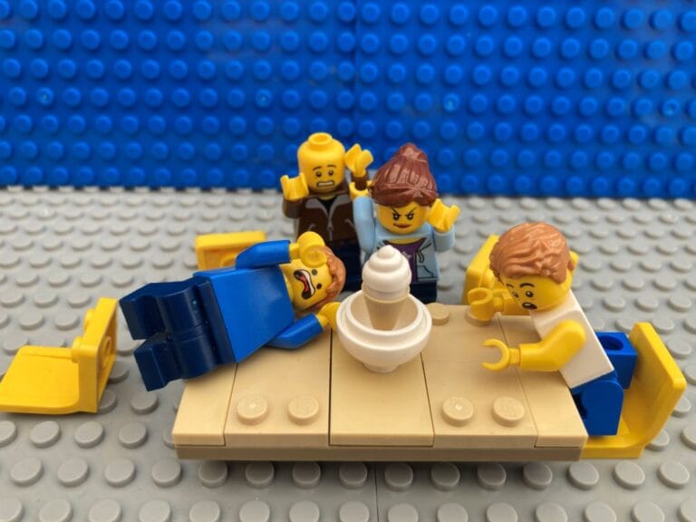 four family members reaching for one ice-cream all at the same time