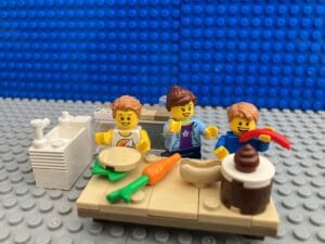 Children helping Mum make packed lunches for the next day