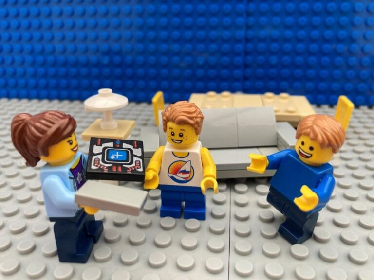 Mum giving a screen to children
