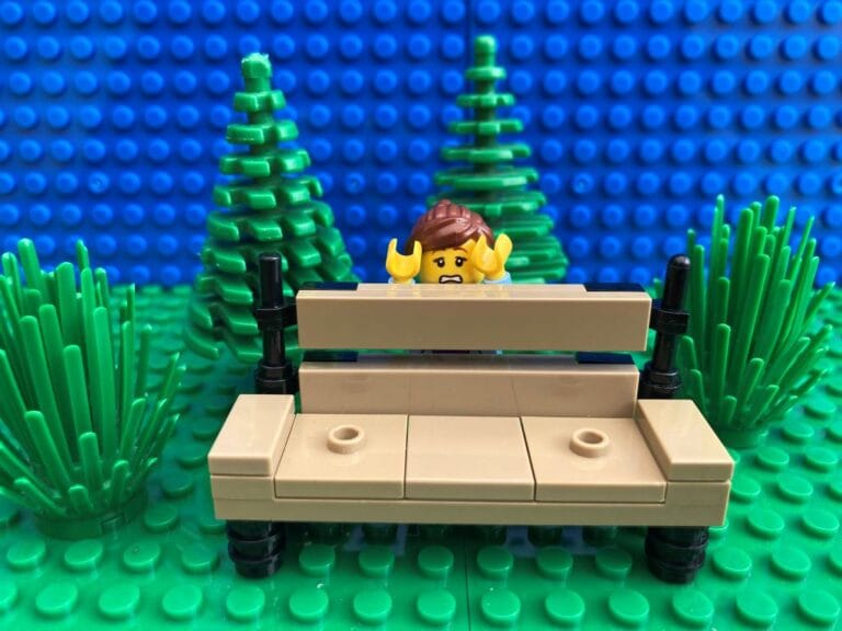 Mum hiding behind a bench
