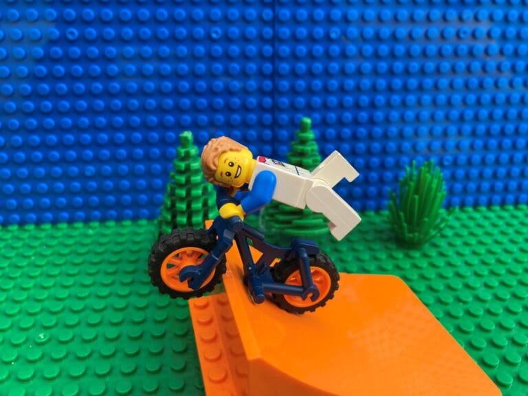 Child pretending to be a bike stunt double