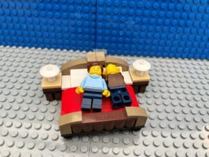 Parents sleeping in bed