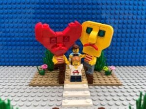 Both Head and Heart characters holding back young child from crossing the road