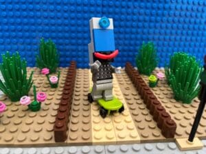 Smartphone character happy on a skateboard