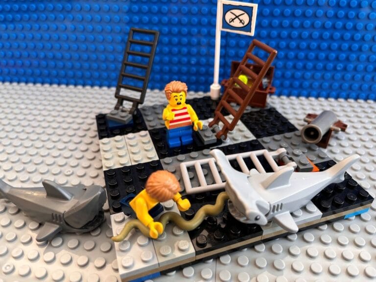 one child chasing a giant snakes on a snakes and ladders board game