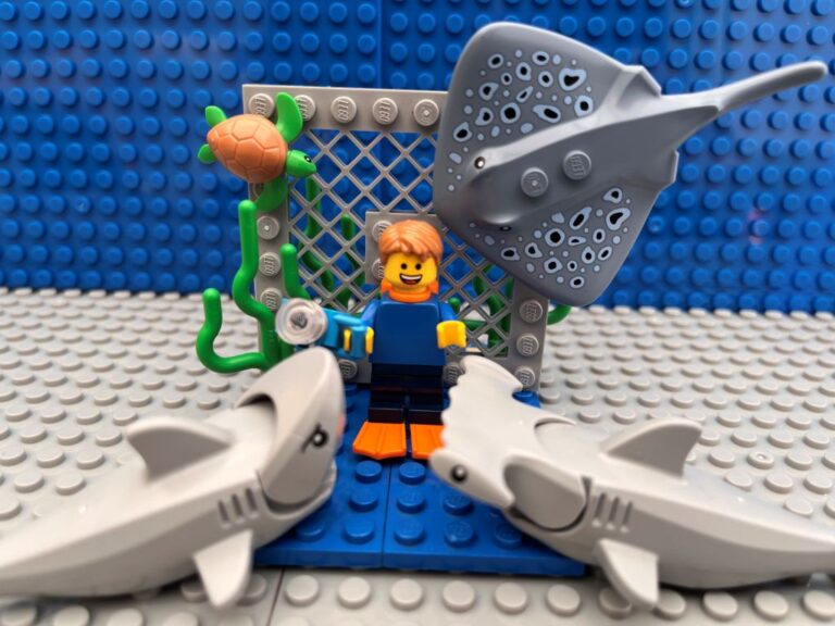 Dream image of a child swimming with sharks