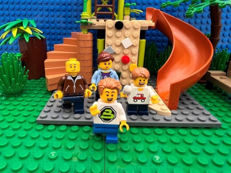 Child running out of the play park with parents walking behind